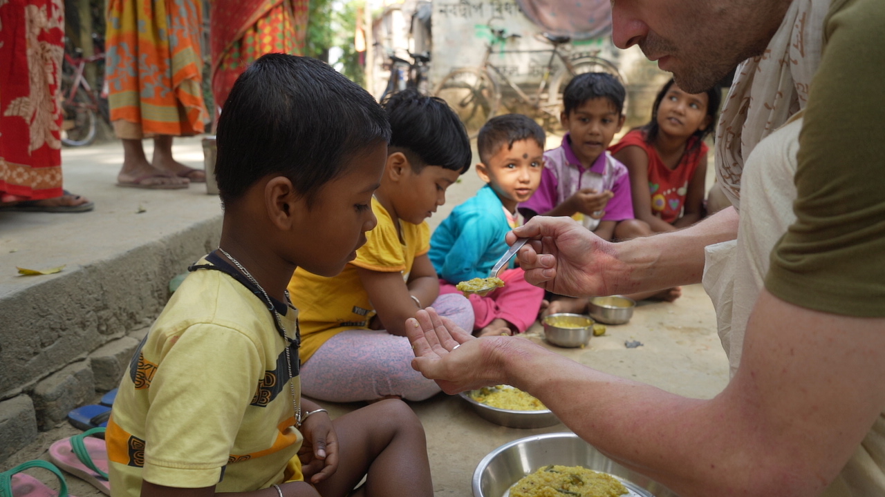 Serving prasadam to children