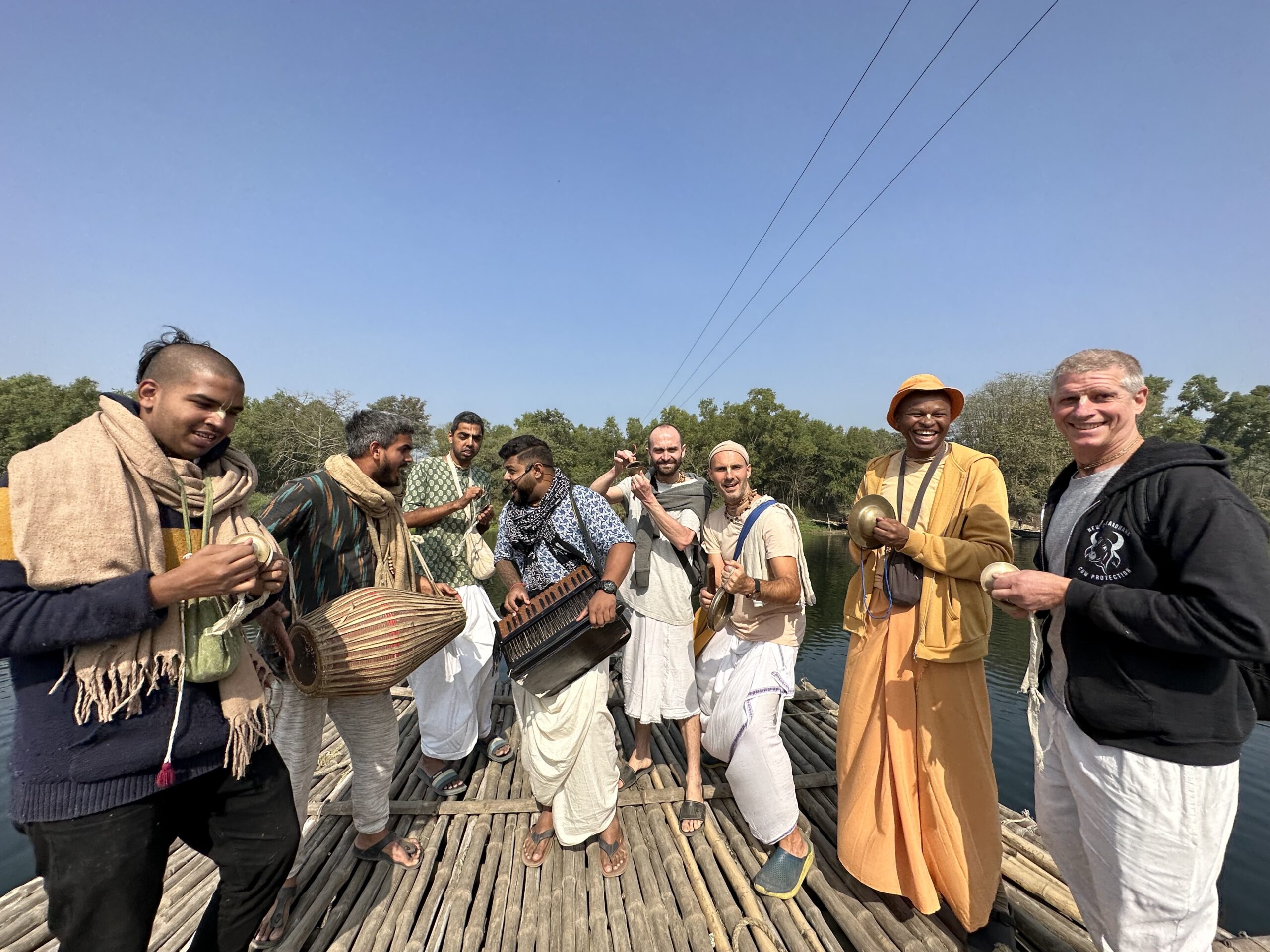 Team on the river with kirtan